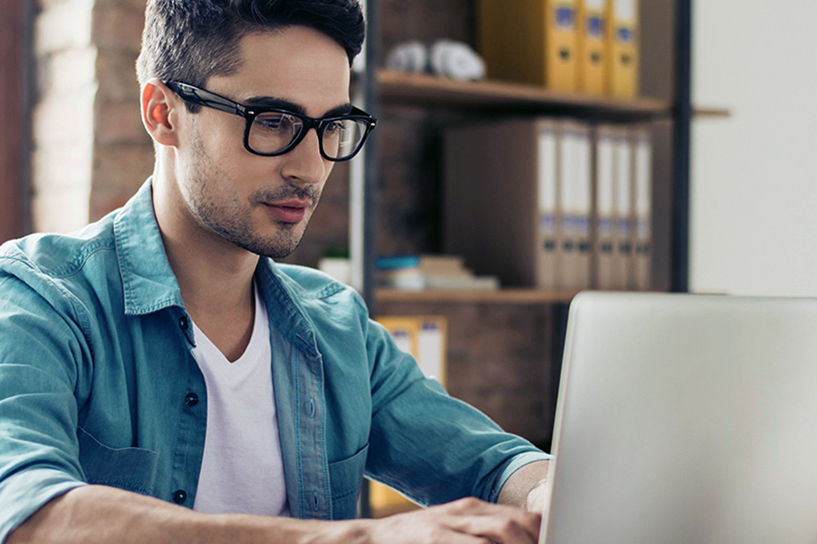 man working on laptop